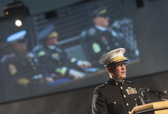 U.S. Marine Gen. Joseph F. Dunford Jr., chairman of the Joint Chiefs of Staff, delivers remarks at the change of responsibility ceremony for the Senior Enlisted Advisor to the Chairman of the Joint Chiefs of Staff in Conmy Hall on Joint Base Myer-Henderson Hall, Va., Dec. 11, 2015. U.S. Army Command Sgt. Maj. John W. Troxell is the new SEAC, after succeeding U.S. Marine Corps Sgt. Maj. Bryan B. Battaglia, who retired after 36 years in service.