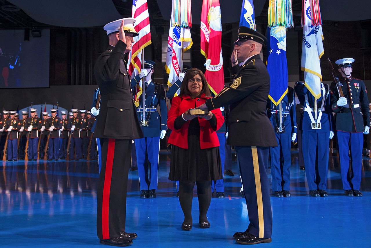 Marine Corps Gen. Joseph F. Dunford Jr., chairman of the Joint Chiefs of Staff, swears in Army Command Sgt. Maj. John W. Troxell as the third senior enlisted advisor to the chairman of the Joint Chiefs of Staff during a change of responsibility ceremony on Joint Base Myer-Henderson Hall, Va., Dec. 11, 2015. DoD photo by Navy Petty Officer 2nd Class Dominique A. Pineiro