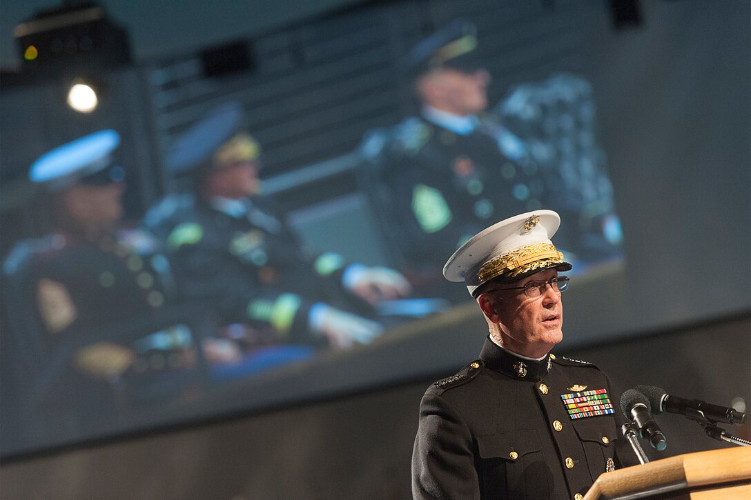 Marine Corps Gen. Joseph F. Dunford Jr., chairman of the Joint Chiefs of Staff, delivers remarks at the change of responsibility ceremony for the senior enlisted advisor to the Chairman of the Joint Chiefs of Staff on Joint Base Myer-Henderson Hall, Va., Dec. 11, 2015. Army Command Sgt. Maj. John W. Troxell was sworn in while Marine Corps Sgt. Maj. Bryan B. Battaglia retired after 36 years in service. DoD photo by Navy Petty Officer 2nd Class Dominique A. Pineiro