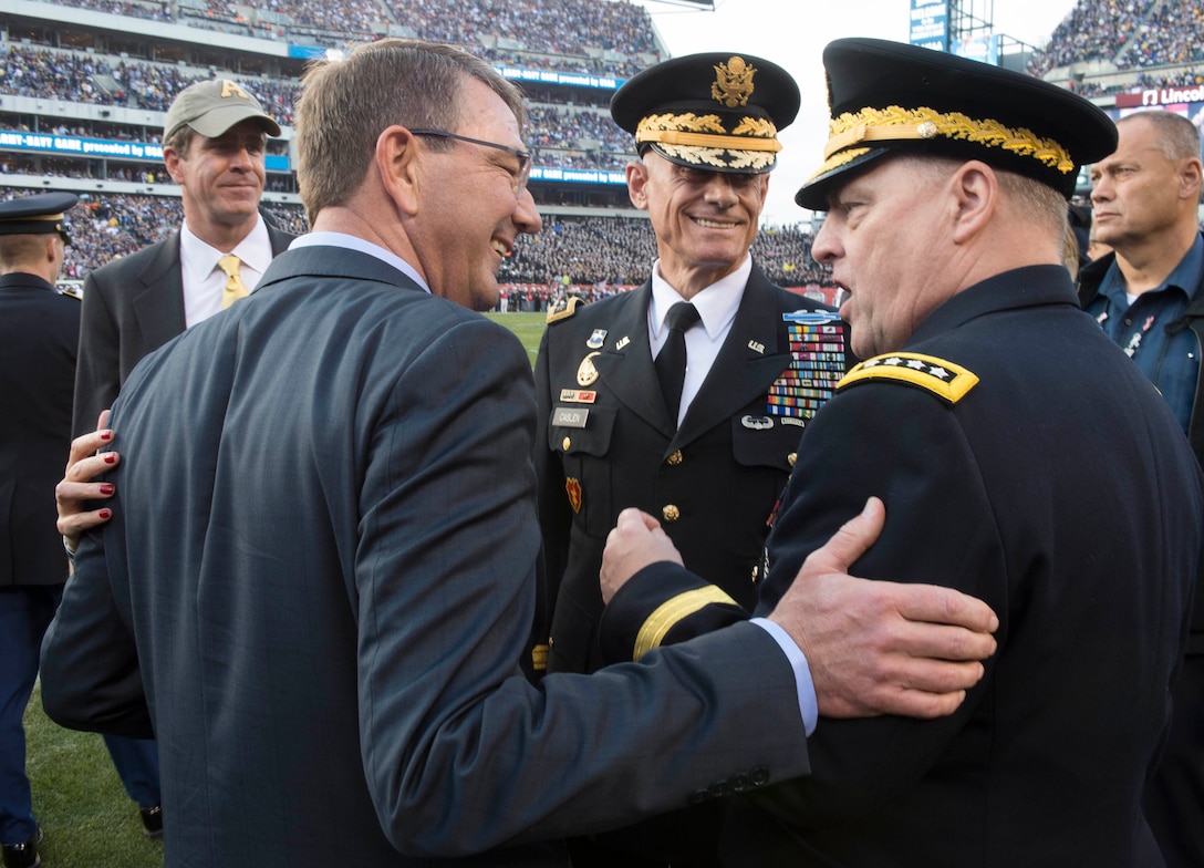Defense Secretary Ash Carter talks with Army Chief of Staff Gen. Mark A. Milley and and U.S. Military Academy Superintendent Army Lt. Gen. Robert Caslen at the 2015 Army-Navy football game in Philadelphia, Dec. 12, 2015. DoD photo by Navy Petty Officer 1st Class Tim D. Godbee