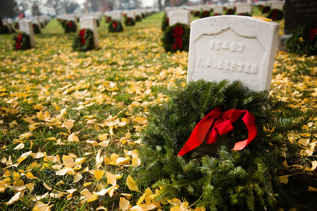 Wreaths adorn grave markers following the annual Wreaths Across America event in Arlington National Cemetery in Arlington, Va., Dec. 12, 2015. U.S. Army photo by Rachel Larue 