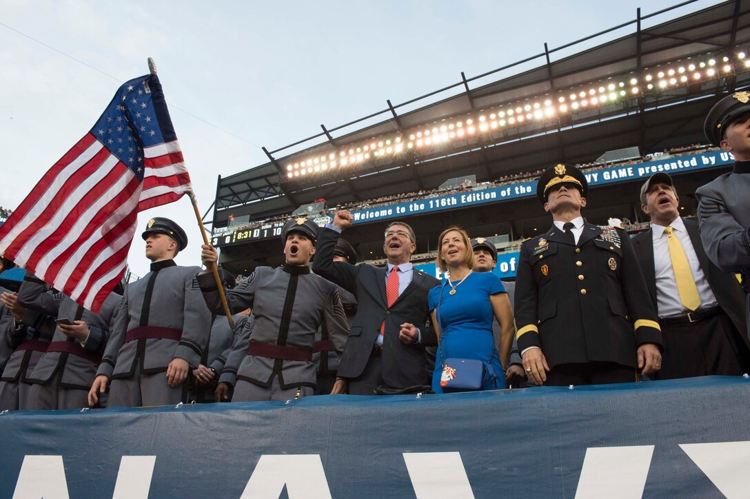 Defense Secretary Ash Carter cheers with U.S. Military Academy  cadets at the 2015 Army-Navy football game in Philadelphia, Dec. 12, 2015. DoD photo by Navy Petty Officer 1st Class Tim D. Godbee