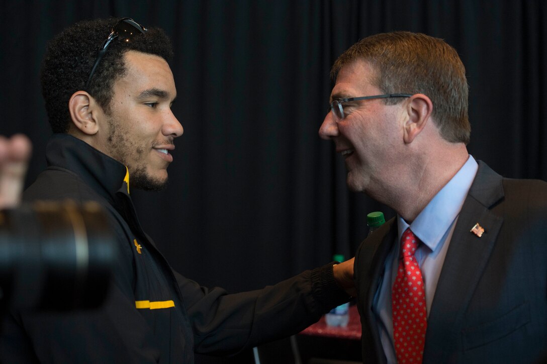 Defense Secretary Ash Carter meets an Army wounded warrior at the 2015 Army-Navy football game in Philadelphia, Dec. 12, 2015.DoD photo by Navy Petty Officer 1st Class Tim D. Godbee