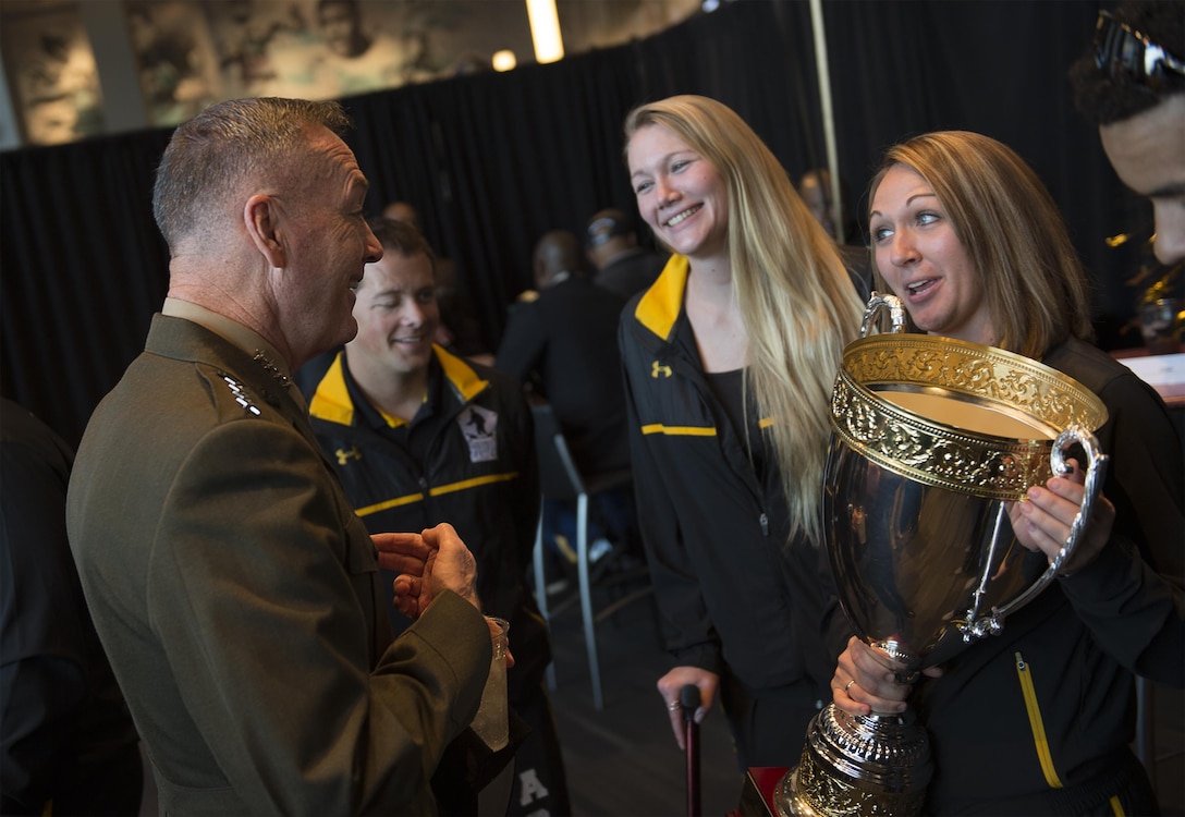 Marine Corps Gen. Joseph F. Dunford Jr., chairman of the Joint Chiefs of Staff, talks with members of the Army Wounded Warrior Program at the 116th Army-Navy football game in Philadelphia, Dec. 12, 2015. DoD Photo by Navy Petty Officer 2nd Class Dominique A. Pineiro