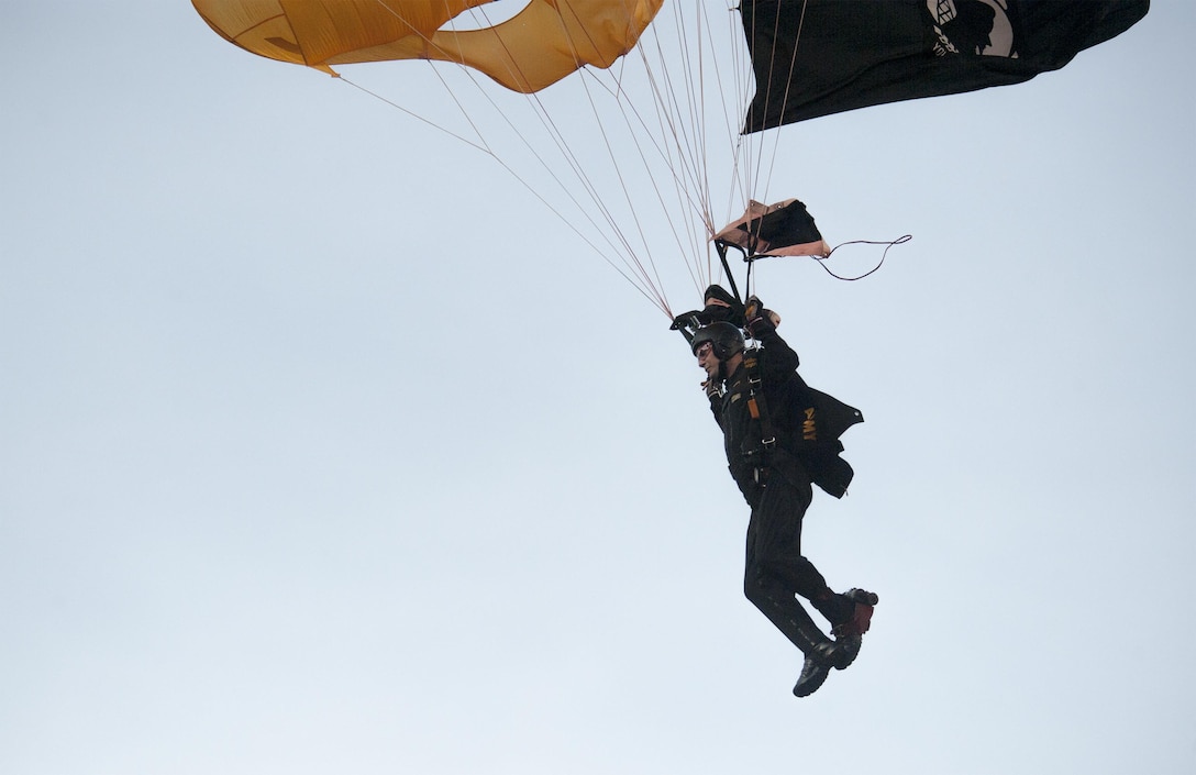 A member of the U.S. Army parachute team, the Golden Knights, jumps into the stadium prior to the 116th Army-Navy football game in Philadelphia, Dec. 12, 2015. DoD photo by Navy Petty Officer 2nd Class Dominique A. Pineiro