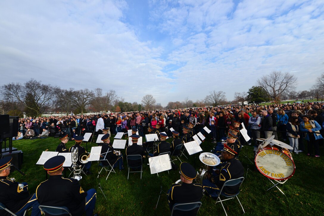The United States Army Band and thousands of volunteers listen to opening remarks during Wreaths Across America in Arlington National Cemetery in Arlington, Va., Dec. 12, 2015. DoD photo by Sebastian Sciotti Jr.
