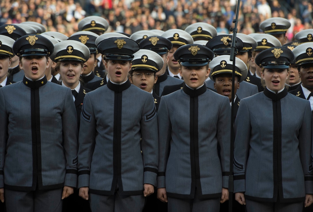 U.S. Military Academy at West Point cadets and Naval Academy midshipmen sing the national anthem at the 2015 Army Navy Game in Philadelphia, Dec. 12, 2015. DoD photo by Petty Officer 1st Class Tim D. Godbee