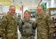 Air Force Chief of Staff Gen. Mark A. Welsh III, left, poses for a picture with 1st Lt. Meghan Eckenrode, of the 379th Expeditionary Security Forces Squadron, and Chief Master Sgt. of the Air Force James A. Cody in the Blatchford-Preston Complex Dining Facility at Al Udeid Air Base, Qatar, Dec. 11. Welsh and Cody met with Airmen during their visit to AUAB and thanked them for their service. (U.S. Air Force photo/Tech. Sgt. James Hodgman)