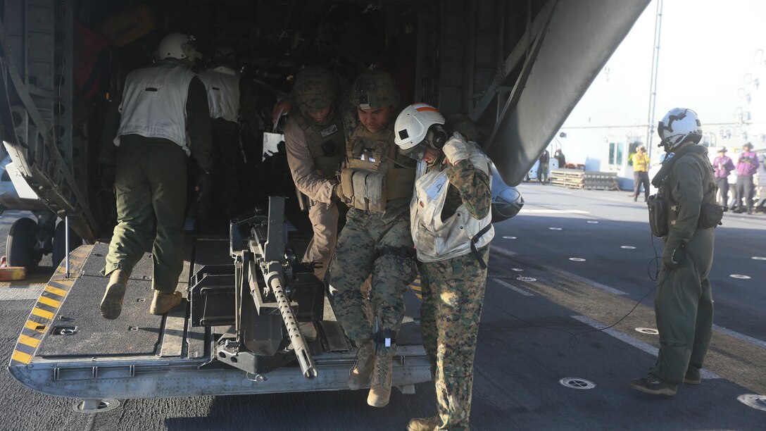 U.S. Marines with the 13th Marine Expeditionary Unit transported a purification system with a CH-53E helicopter from the USS New Orleans to the Purple Islands Dec. 7, 2015, as part of Operation Intrinsic Fidelity.
