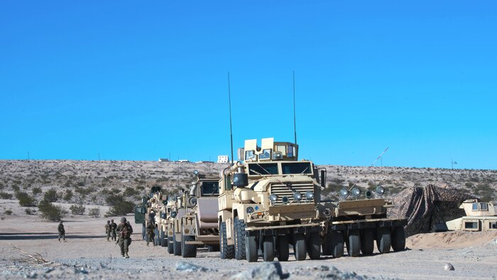 Marines prepare for a route clearance drill during Exercise Steel Knight at Marine Corps Air Ground Combat Center Twentynine Palms, California, Dec. 12, 2015. The Marines are with 1st Combat Engineer Battalion. During route clearance Marines use a variety of vehicles to search for improvised explosive devices, mines and other dangerous obstructions. Steel Knight is a 1st Marine Division led exercise, which enables the Marines and sailors to operate in a realistic environment to develop skill sets necessary to maintain a fully capable Marine Air Ground Task Force.