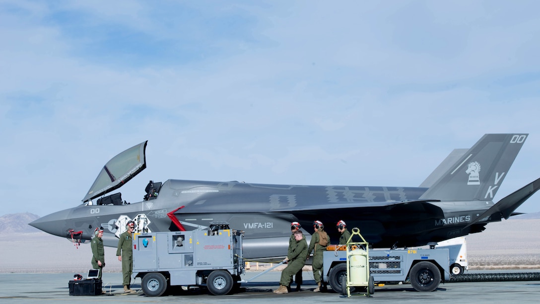 Marines hook up support equipment before a weapons functional test during Exercise Steel Knight at Marine Corps Air Ground Combat Center Twentynine Palms, California, Dec. 10, 2015. The Marines are with Marine Fighter Attack Squadron 121 and Marine Operational and Test Evaluation Squadron 22. The F-35B is a single seat, single engine stealth multi-role fighter bringing the Marine Corps into a whole new generation of aircraft. Exercise Steel Knight allowed for VMFA-121 and VMX-22 to train on integrating the F-35B and find its place in the Marine Air Ground Task Force, while giving the ground forces of 1st Marine Division the ability to become familiar with it.