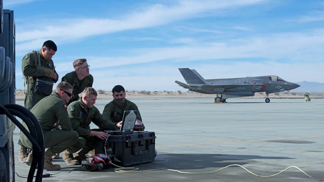 Marines perform a weapons functional test on an F-35B Lightning II aircraft during Exercise Steel Knight at Marine Corps Air Ground Combat Center Twentynine Palms, California, Dec. 10, 2015. The F-35B is a single seat, single engine stealth multi-role fighter bringing the Marine Corps into a whole new generation of aircraft. Exercise Steel Knight allowed for Marine Fighter Attack Squadron 121 and Marine Operational and Test Evaluation Squadron 22 to train on integrating the F-35B and find its place in the Marine Air Ground Task Force, while giving the ground forces of 1st Marine Division the ability to become familiar with it.