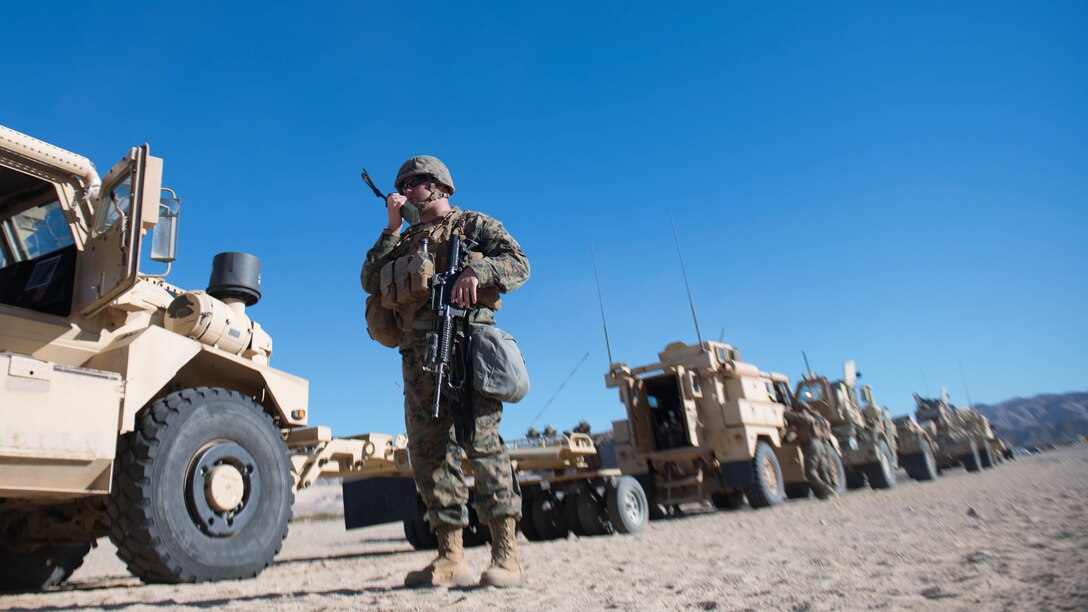 Staff Sgt. Jason Fair prepares for a route clearance drill during Exercise Steel Knight at Marine Corps Air Ground Combat Center Twentynine Palms, California, Dec. 13, 2015. Fair is with 1st Combat Engineer Battalion. During route clearance Marines use a variety of vehicles to search for improvised explosive devices, mines and other dangerous obstructions. Steel Knight is a 1st Marine Division led exercise, which enables the Marines and sailors to operate in a realistic environment to develop skill sets necessary to maintain a fully capable Marine Air Ground Task Force.