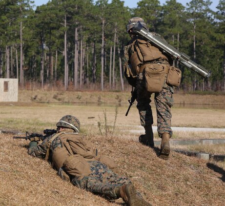A Marine with 3rd Battalion, 6th Marine Regiment, advances down range during a battalion exercise at Marine Corps Base Camp Lejeune, N.C., Dec. 10, 2015. The battalion-wide exercise reinforced basic infantry skills and brought junior Marines up to optimal operability across the companies. 