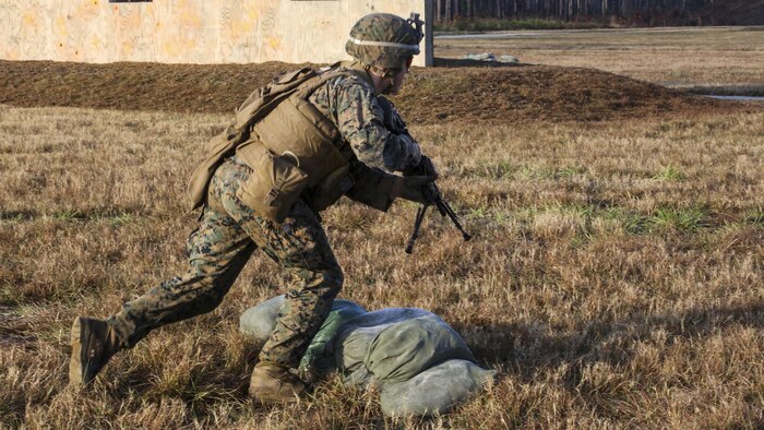 A Marine with 3rd Battalion, 6th Marine Regiment advances down range during a battalion exercise at Marine Corps Base Camp Lejeune, N.C., Dec. 10, 2015. The battalion-wide exercise reinforced basic infantry skills and brought junior Marines up to optimal operability across the companies. 