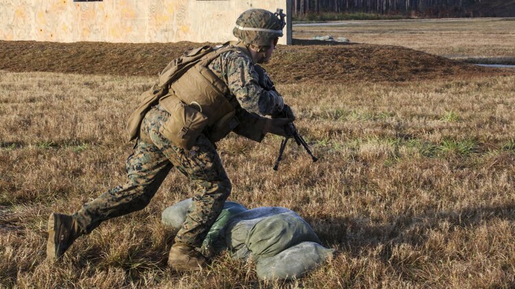 A Marine with 3rd Battalion, 6th Marine Regiment advances down range during a battalion exercise at Marine Corps Base Camp Lejeune, N.C., Dec. 10, 2015. The battalion-wide exercise reinforced basic infantry skills and brought junior Marines up to optimal operability across the companies. 