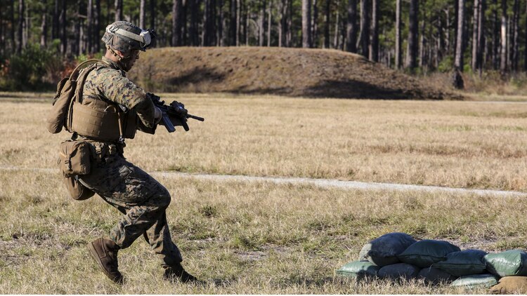 A Marine with 3rd Battalion, 6th Marine Regiment advances down range during a battalion exercise at Marine Corps Base Camp Lejeune, N.C., Dec. 10, 2015. The battalion-wide exercise reinforced basic infantry skills and brought junior Marines up to optimal operability across the companies. 