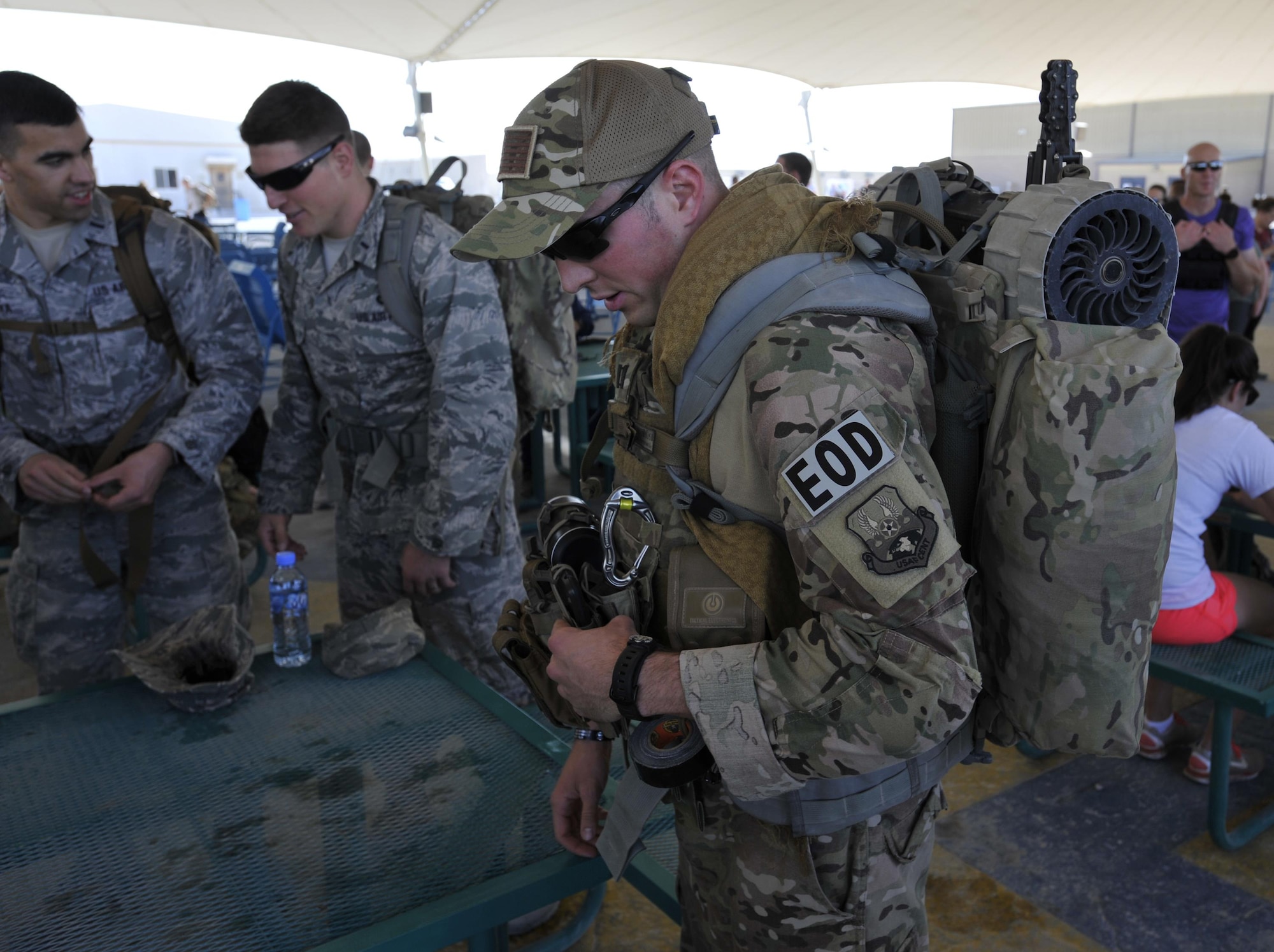 Members prepare for the Fallen Defenders Ruck to Remember on Dec. 12, 2015, at Al Udeid Air Base, Qatar. The 12-kilometer ruck march honors security forces defenders who have made the ultimate sacrifice in support of operations in Iraq and Afghanistan. (U.S. Air Force photo/Master Sgt. Joshua Strang)