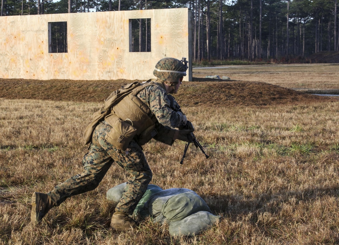 A Marine with 3rd Battalion, 6th Marine Regiment advances down range during a battalion exercise at Camp Lejeune, N.C., Dec. 10, 2015. The battalion-wide exercise reinforced basic infantry skills and brought junior Marines up to optimal operability across the companies. (U.S. Marine Corps photo by Cpl. Paul S. Martinez/Released)