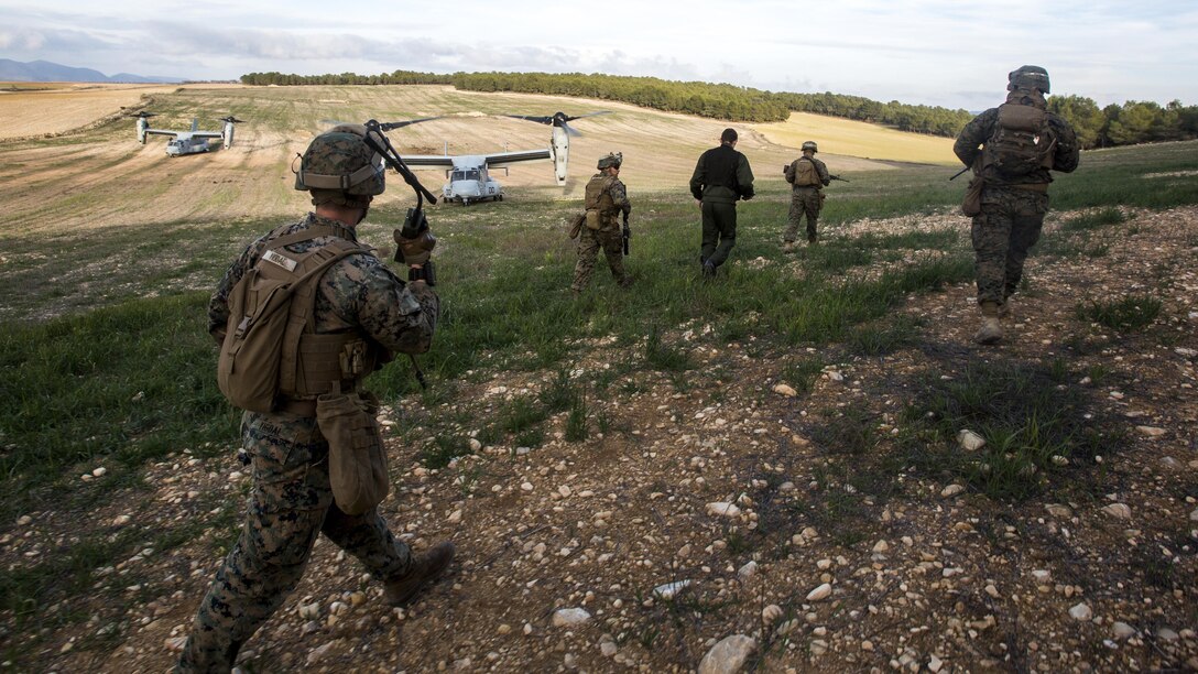 U.S. Marines with Special-Purpose Marine Air-Ground Task Force Crisis Response-Africa recover a simulated downed French pilot during a Tactical Recovery of Aircraft and Personnel exercise, Dec. 7, 2015, near Albacete, Spain. More than 900 participants from 10 NATO nations participated in a month-long flying course hosted by the Tactical Leadership Programme, based out of Los Llanos Air Base, Spain.  