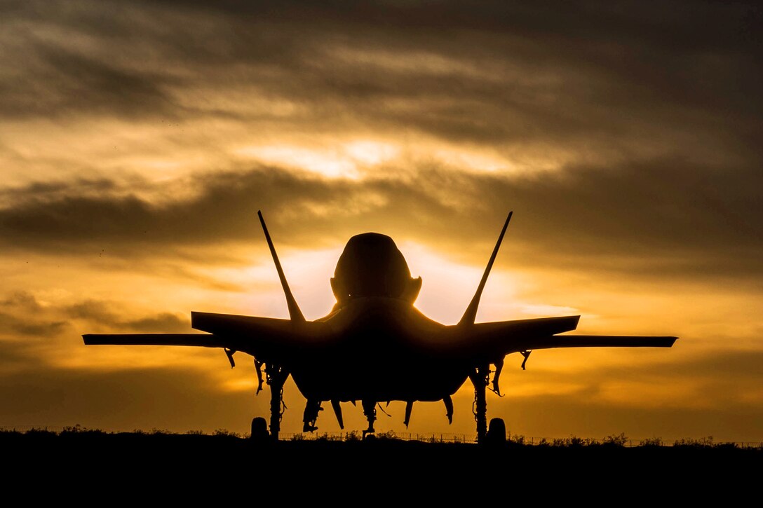 An F-35B Lightning II sits as the sun sets on Marine Corps Air Ground Combat Center Twentynine Palms, Calif., Dec. 10, 2015. The aircraft is participating in Exercise Steel Knight, an integrated live-fire exercise with the 1st Marine Division. U.S. Marine Corps photo by Cpl. Cameron Storm