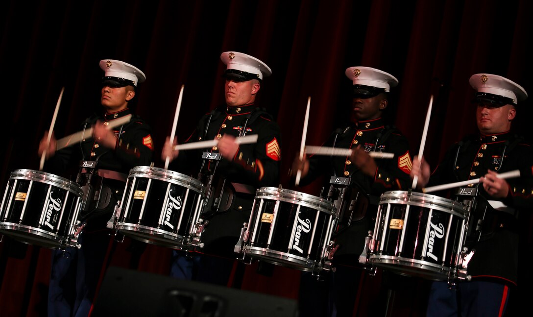 Percussionists with Marine Corps Band New Orleans perform on stage during their holiday concert, “Santa Meets Sousa,” at Saenger Theater in New Orleans, Louisiana on Dec. 11, 2015. The performance was part of their yearly Toys for Tots tour, where they accepted new, unwrapped toys from audience members to give to less fortunate children during the holiday season. 