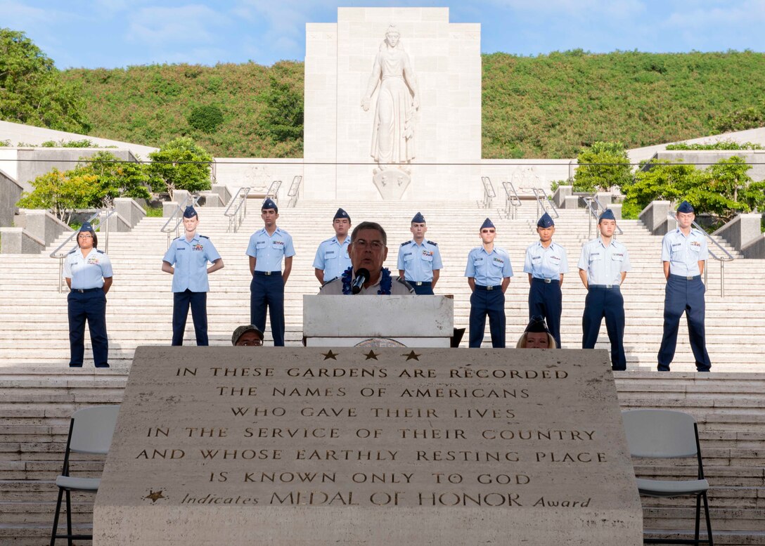 Air Force Brig. Gen. Larry Myrick addresses audience members at a holiday wreath-laying ceremony at the National Memorial Cemetery of the Pacific in Honolulu, Dec. 12, 2015. U.S. Navy photo by Petty Officer 2nd Class Jeff Troutman