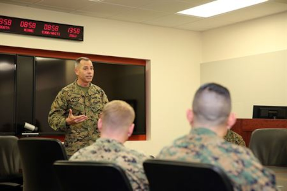 DORAL, Fla. - Brigadier General Paul K. Lebidine, the commanding general for 4th Marine Division, speaks to the members of the U.S. Marine Corps Forces, South Security-Cooperation-Team prior to their deployment to Central America. The Security Cooperation Team will focus on developing, building and sustaining partnerships, and increasing regional stability through tailor-made training to fit the unique needs of Partner Nation forces. (Official Marine Corps photo by SSgt. Earnest J. Barnes/Released)