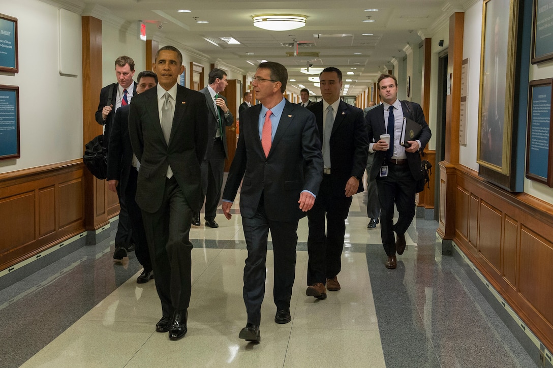 Defense Secretary Ash Carter, right, walks with President Barack Obama as he arrives at the Pentagon, Dec. 14, 2015, to meet with the National Security Council about the fight against the Islamic State of Iraq and the Levant, or ISIL. DoD photo by Air Force Senior Master Sgt. Adrian Cadiz