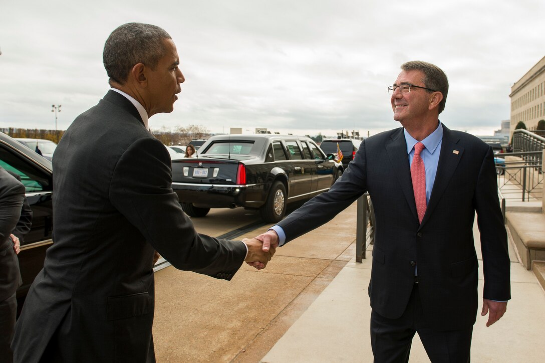 Defense Secretary Ash Carter greets President Barack Obama as he arrives at the Pentagon, Dec. 14, 2015, to meet with his National Security Council about the fight against the Islamic State of Iraq and the Levant, or ISIL. DoD photo by Air Force Senior Master Sgt. Adrian Cadiz