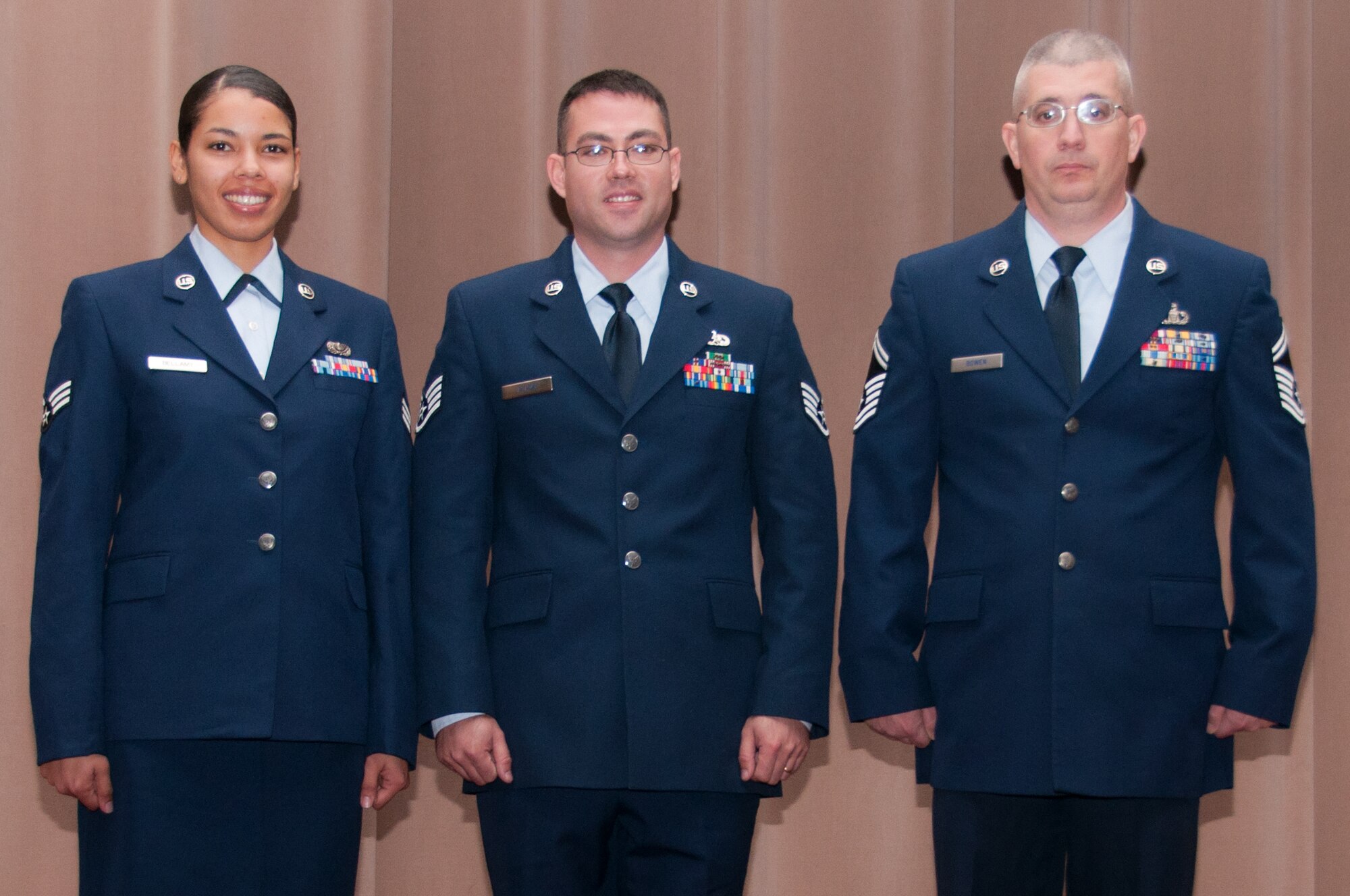 U.S. Air Force Senior Airman Destiny Bellamy, Staff Sgt. Joshua Adams and Senior Master Sgt. Lowell Bowen were selected as Airman, Noncommissioned Officer and Senior Noncommissioned Officer of the Quarter for the period covering July to September 2015. They were given a collection of awards during a 307th Bomb Wing Commander's Call on Dec. 6, 2015, Barksdale Air Force Base, La. Bellamy is assigned to the 307th Force Support Squadron, Adams to the 307th Maintenance Squadron and Bowen to the 307th Bomb Wing. (U.S. Air Force photo by Master Sgt. Laura Siebert/Released)