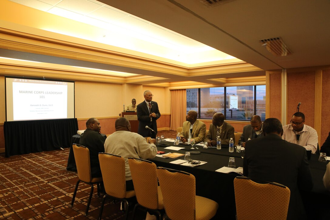 Dr. Kenneth Dunn, Col, USMC retired, presents a Marine Corps leadership brief to members of 100 Black Men of American Inc. in order to strengthen member leadership skills and provide them the tools to mentor youths. He made his presentation at the organization’s leadership summit in Jacksonville, Florida on December 3rd, 2015. Marine Corps Recruiting Command, Office of Diversity maintains a partnership with 100 Black Men of America in order to educate and inform its membership of over 125,000 African-American influencers and youth about Marine Corps educational and career opportunities.
