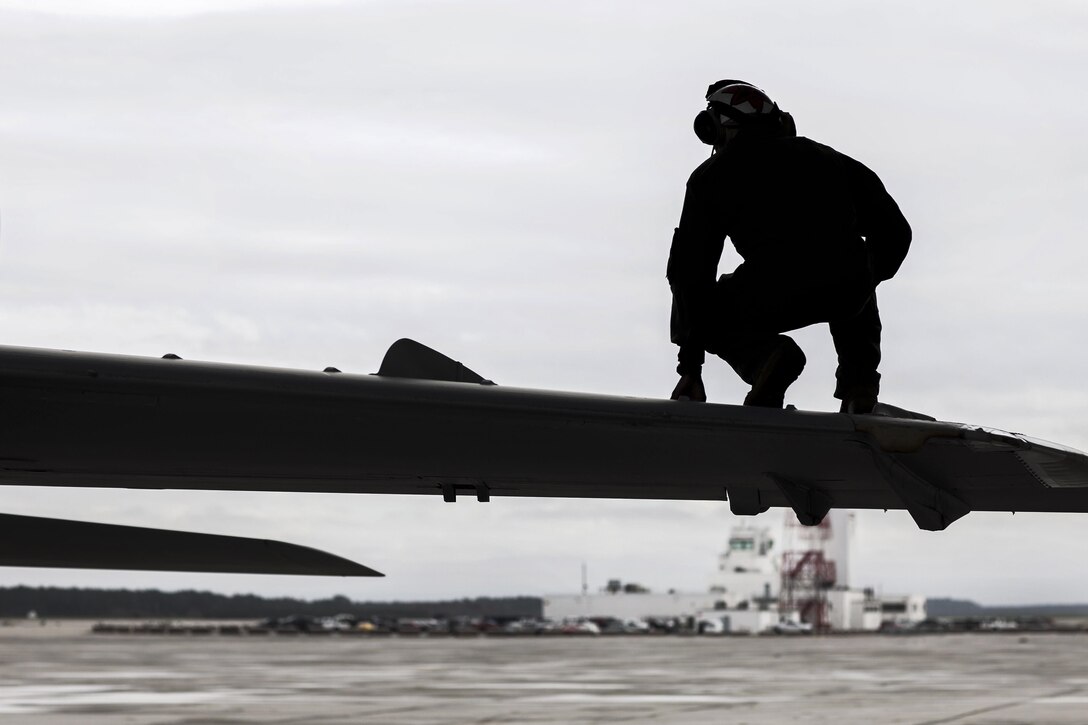 Marine Corps Cpl. Marvin M. Ernest performs a turn-around inspection on an EA-6B Prowler on Marine Corps Air Station Cherry Point, N.C., Dec. 1, 2015. U.S. Marine Corps photo by Lance Cpl. Jered T. Stone