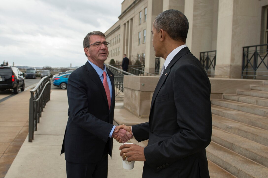 Defense Secretary Ash Carter, left, shakes hands with President Barack Obama as he departs the Pentagon, Dec. 14, 2015, after meeting with his National Security Council about the fight against the Islamic State of Iraq and the Levant, or ISIL. DoD photo by Air Force Senior Master Sgt. Adrian Cadiz