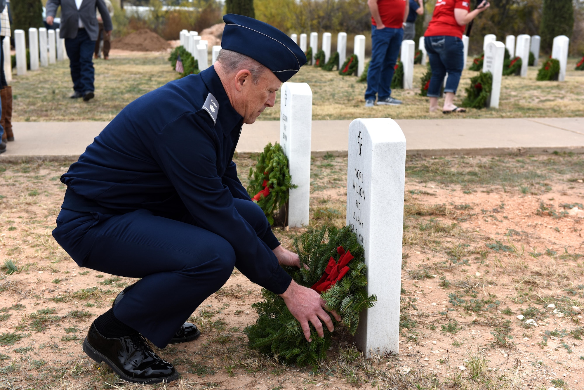 U.S. Civil Air Patrol  Capt.Garry A. Nussey, San Angelo Composite Squadron, lays a wreath at the Belvedere Cemetery in San Angelo, Texas, Dec. 12, 2015. The wreath was to honor the deceased veteran Pfc. Norl Wilson. (U.S. Air Force photo by Airman Chase Sousa/Released)