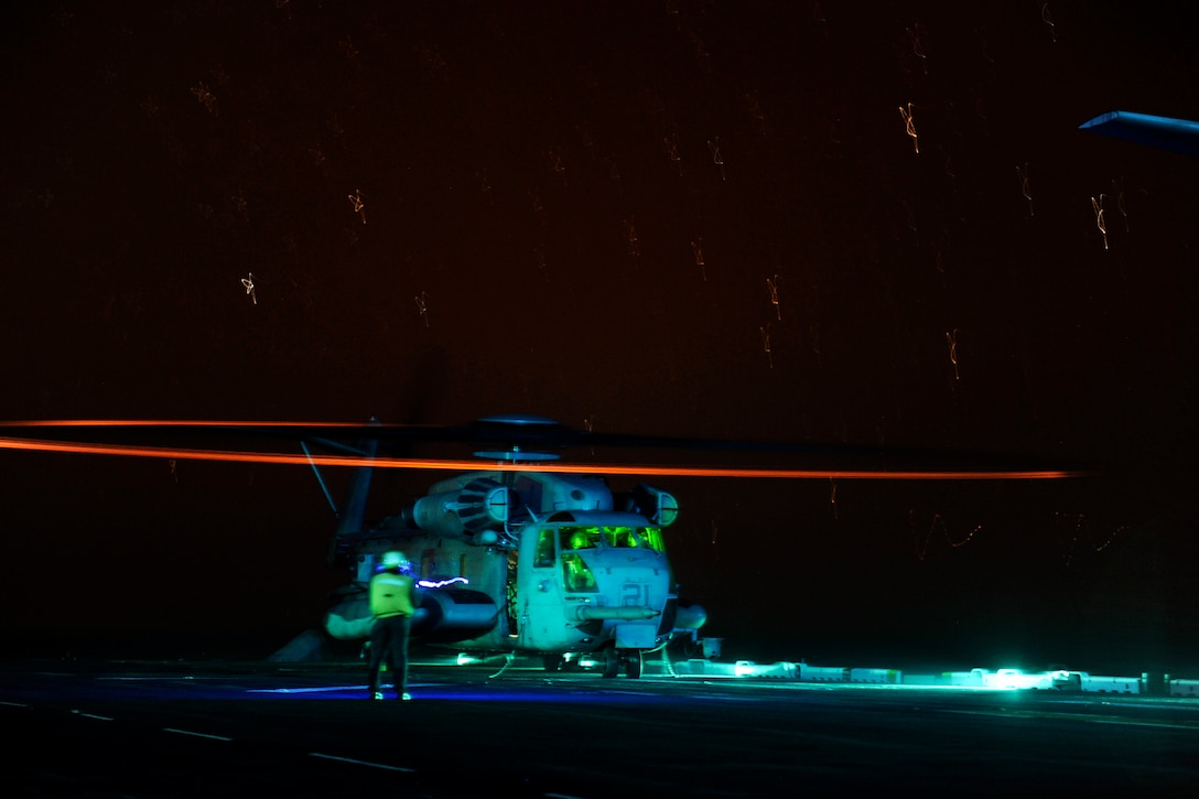 A Marine Corps CH-53 Sea Stallion prepares to launch from the USS Boxer in the Pacific Ocean, Dec. 12, 2015. The Boxer Amphibious Ready Group is underway off the coast of Southern California completing a certification exercise. The Sea Stallion is assigned to Marine Medium Tiltrotor Squadron 166. U.S. Navy photo by Petty Officer Seaman Eric C. Burgett