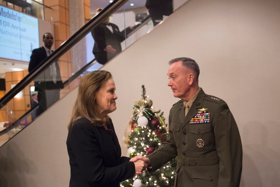 Marine Corps Gen. Joseph F. Dunford Jr., right, chairman of the Joint Chiefs of Staff, and Michele Flournoy, former undersecretary of defense for policy, talk after a discussion at the Center for a New American Security's National Security Forum in Washington, D.C., Dec. 14, 2015. DoD photo by D. Myles Cullen 