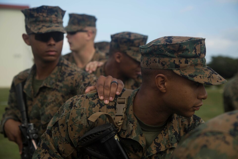 Lance Cpl. Christian E. Miller prepares to clear a building during a simulated room clearing training exercise on Camp Hansen in Okinawa, Japan, Dec. 11, 2015. The training, referred to as ‘tape room clearing,’ is essentially military operations in urban terrain training set in a two-dimensional environment where buildings are distinguished by taped outlines on the ground. Miller, a native of Grand Rapids, Michigan, is an infantryman with Alpha Company, Battalion Landing Team 1st Battalion, 5th Marines, 31st Marine Expeditionary Unit. (U.S. Marine photo by Lance Cpl. Samantha Villarreal/Released)