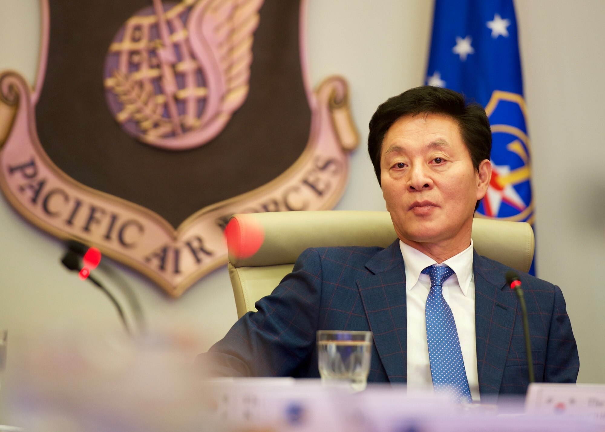 The Honorable Chung, Doo Un, Republic of Korea’s Chairman of the National Assembly Defense Committee, listens to comments during a question and answer session as part of his visit to Headquarters Pacific Air Forces, Joint Base Pearl Harbor-Hickam, Hawaii, Dec. 14, 2015. Chung's visit to PACAF included discussions on U.S. and ROK defense policy issues aimed at strengthening and enhancing both nations' capabilities and readiness during crises. (U.S. Air Force photo by Tech. Sgt. James Stewart/Released)