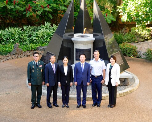 U.S. Air Force Maj. Gen. Mark C. Dillon, Pacific Air Forces vice commander, and the Honorable Chung, Doo Un (center), Republic of Korea’s Chairman of the National Assembly Defense Committee, pose for a group photo during Chung’s visit to PACAF’s headquarters, Joint Base Pearl Harbor-Hickam, Hawaii, Dec. 14, 2015. Chung and Dillon met and discussed U.S. and ROK defense policy issues to strengthen and enhance both nations' capabilities and readiness during crises. (U.S. Air Force photo by Tech. Sgt. James Stewart/Released)