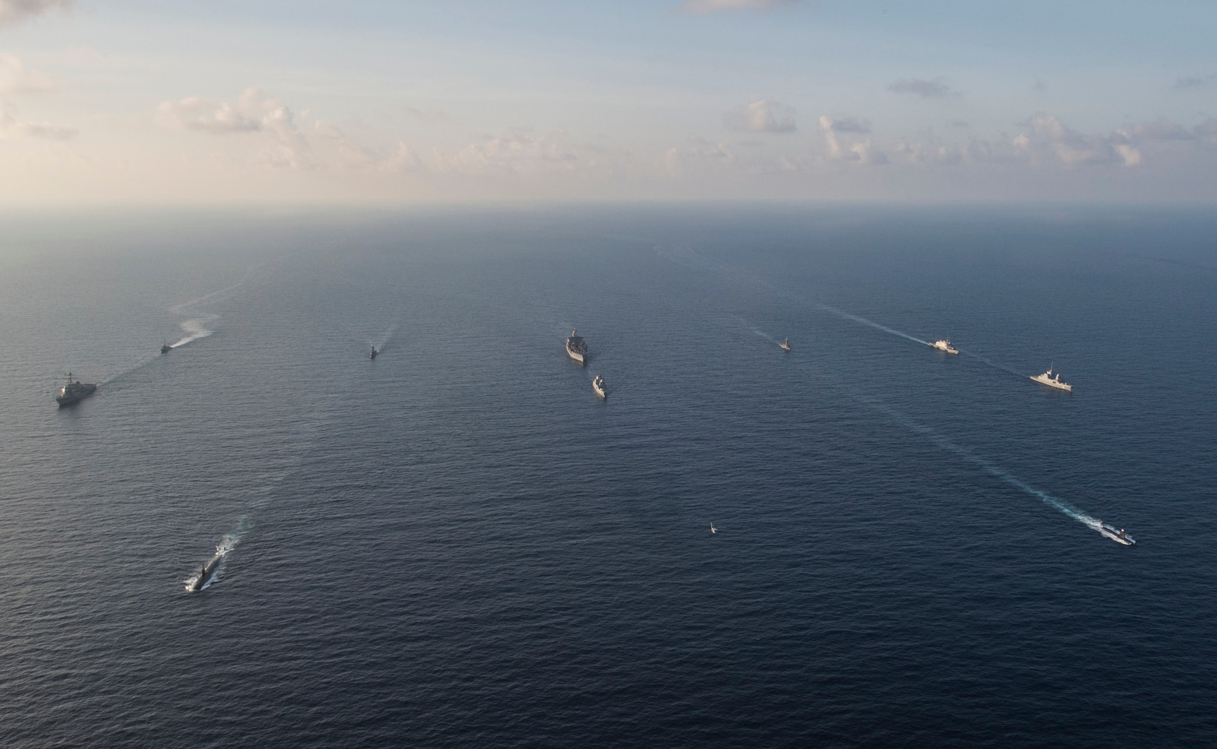 Ships and submarines from the Republic of Singapore navy and U.S. Navy gather in formation during the underway phase of Cooperation Afloat Readiness and Training (CARAT) Singapore 2015. CARAT is an annual, bilateral exercise series with the U.S. Navy, U.S. Marine Corps and the armed forces of nine partner nations. (U.S. Navy photo by Mass Communication Specialist 2nd Class Joe Bishop/Released)