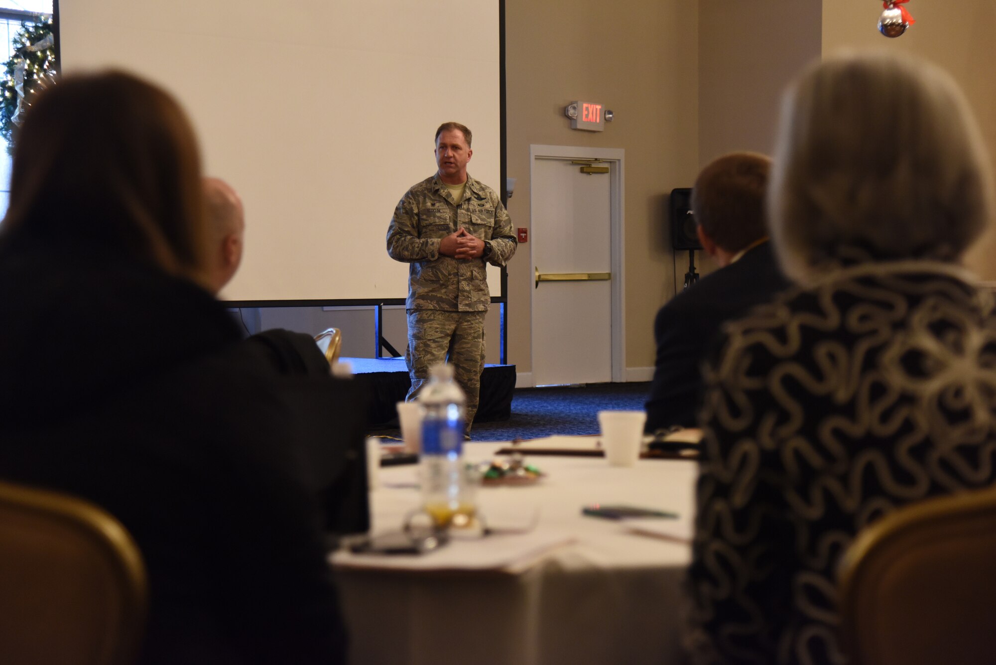 Col. Mark Slocum, 4th Fighter Wing commander, addresses Wayne County Public School principals during the annual WCPS meeting, Dec. 9, 2015, at Seymour Johnson Air Force Base, North Carolina. Slocum discussed the valuable input spouses on base can provide from their experiences from other school systems across the world. (U.S. Air Force photo/Senior Airman Brittain Crolley)