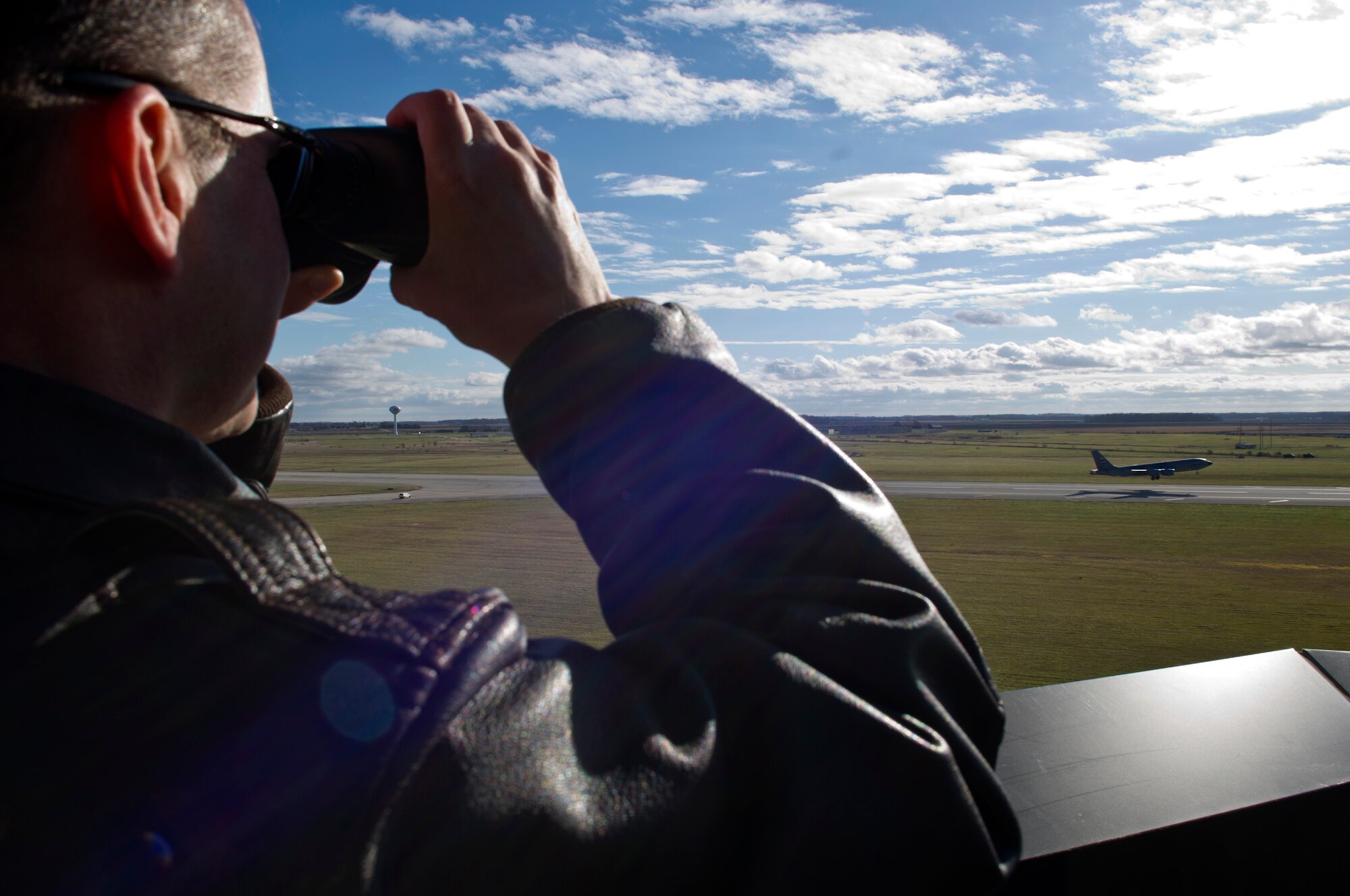 Maj. Jeffrey Benware, 434th Air Refueling Wing chief of safety, observes a KC-135R Stratotanker take off at Grissom Air Reserve Base, Ind., Nov. 19, 2015. As the new chief of safety, Benware’s duties include mishap prevention and combat capability preservation. (U.S. Air Force photo/Senior Airman Katrina Heikkinen)