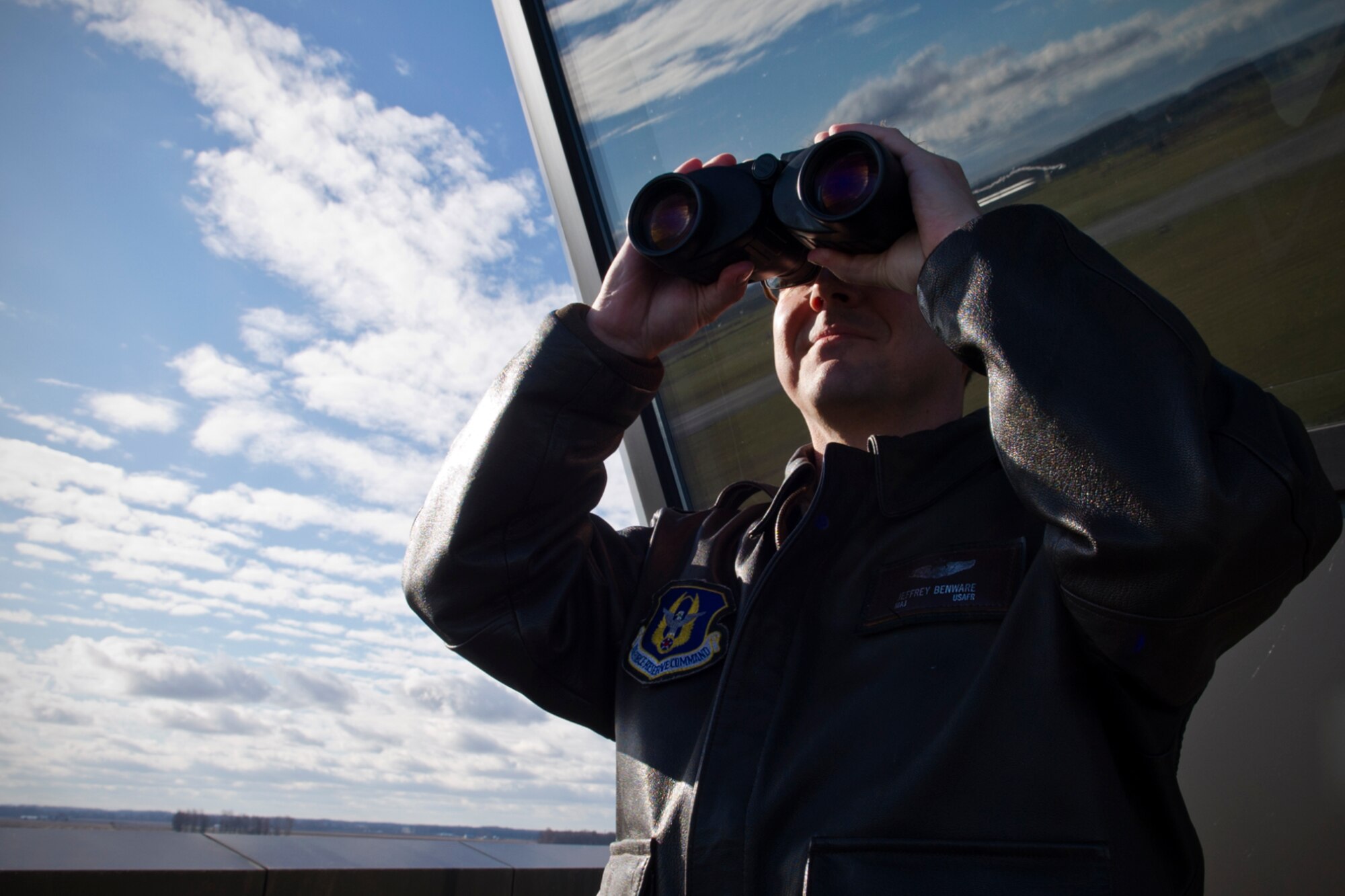 Maj. Jeffrey Benware, 434th Air Refueling Wing chief of safety, observes a KC-135R Stratotanker take off at Grissom Air Reserve Base, Ind., Nov. 19, 2015. As an Air Force technician and KC-135R Stratotanker pilot, Benware’s operational background offers direct insight into mitigating mishaps by implementing safety as the number one key to success. (U.S. Air Force photo/Senior Airman Katrina Heikkinen)