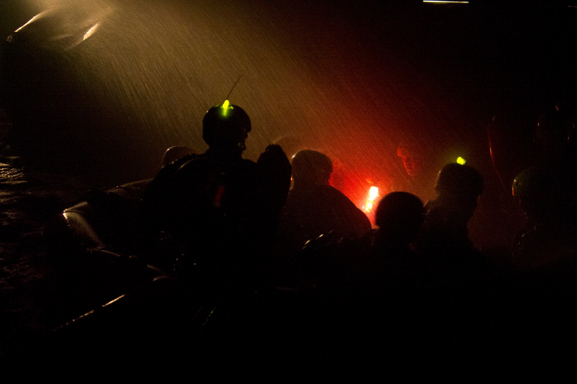 Students prepare to assemble their life raft canopy during a water survival scenario Dec. 8, 2015, at Fairchild Air Force Base, Wash.  During the two Water Survival courses, students learn a multitude of skills and are put through different scenarios simulating being isolated in open water. (U.S. Air Force photo/Airman 1st Class Nick J. Daniello)