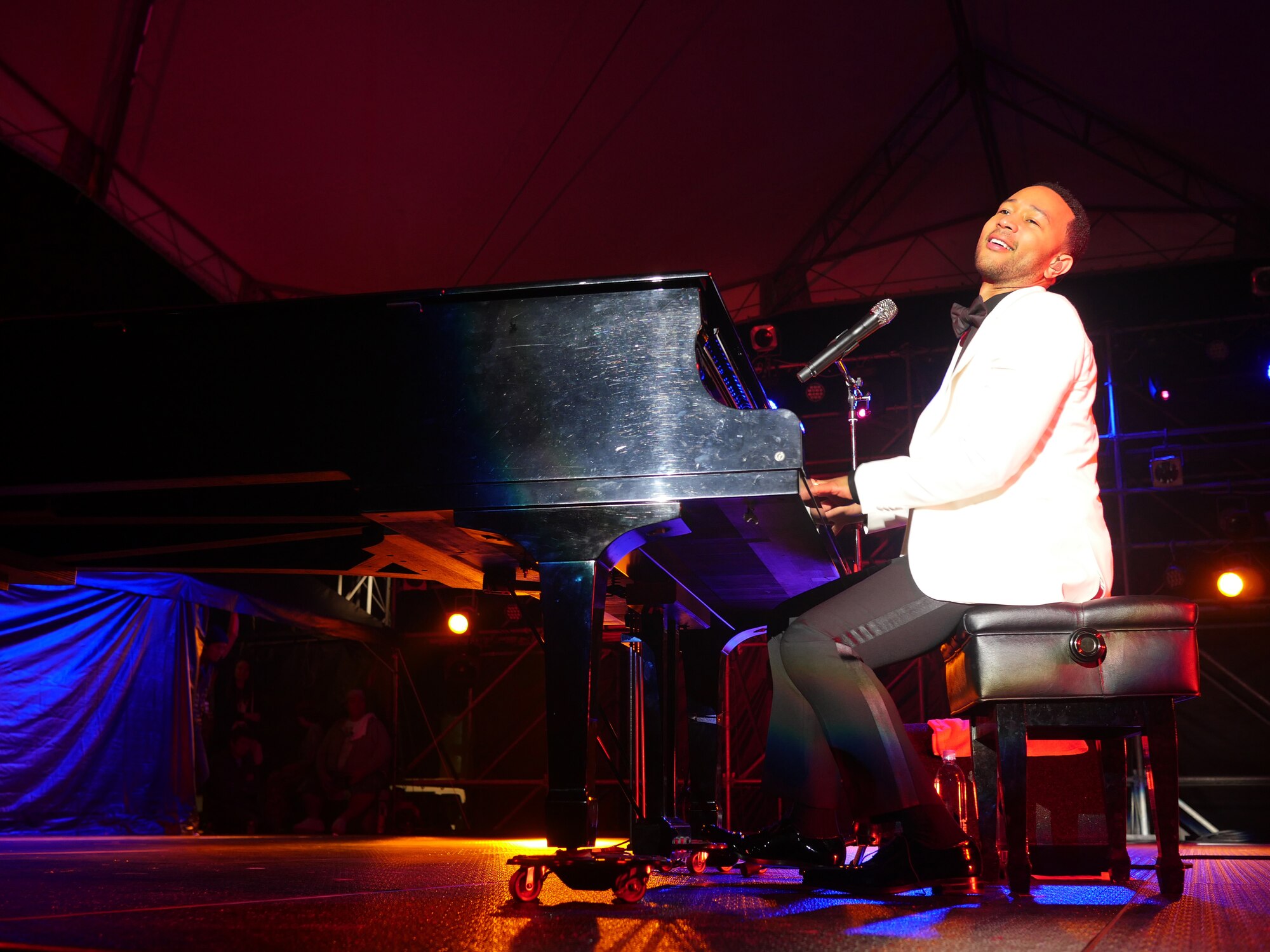 American singer-performer John Legend performs Dec. 12, 2015, during Tinsel Town at Kadena Air Base, Japan. Tinsel Town is Kadena's annual holiday celebration offering meet-and-greets with Santa and Mrs. Claus, games, food and free entertainment. (U.S. Air Force photo by Senior Airman Omari Bernard)
