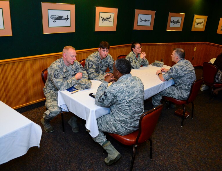Senior NCOs talk to chief master sergeants during a speed mentoring session at Barksdale Air Force Base, La., Dec. 11, 2015. During the session, SNCOs asked chiefs about current issues NCOs face, such as the new Enlisted Performance Report rollout. (U.S. Air Force photo/Senior Airman Benjamin Raughton)