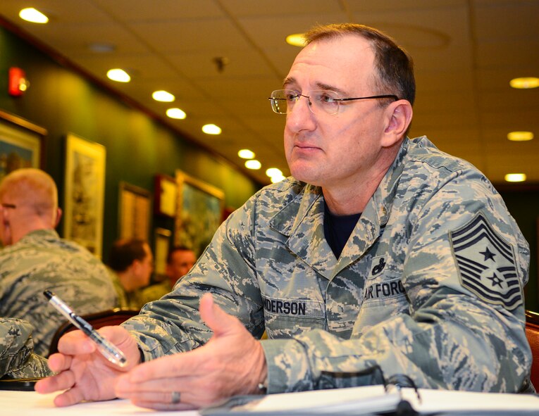 Chief Master Sgt. Marty Anderson, 8th Air Force command chief, answers questions from senior NCOs during a speed mentoring session at Barksdale Air Force Base, La., Dec. 11, 2015. Command chiefs joined other chief master sergeants to provide different perspectives to questions from SNCOs.  (U.S. Air Force photo/Senior Airman Benjamin Raughton)