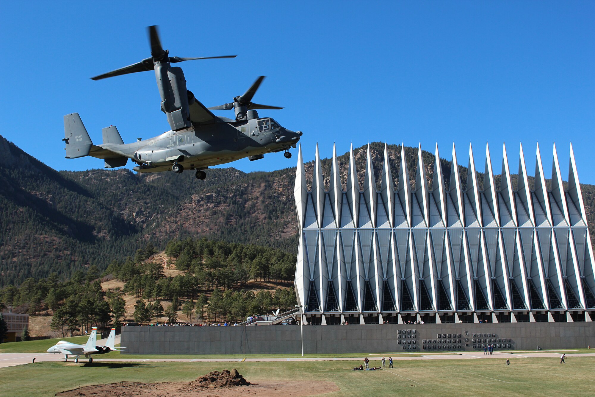 An HH-60G Pavehawk helicopter prepares to land on the terrace of the U.S. Air Force Academy in Colorado Springs, Colo., Nov. 10, 2015. This was one of many events that took place to be filmed and shared by ESPN in correlation to Veterans Day. (U.S. Air Force photo/Dale Eckroth)
