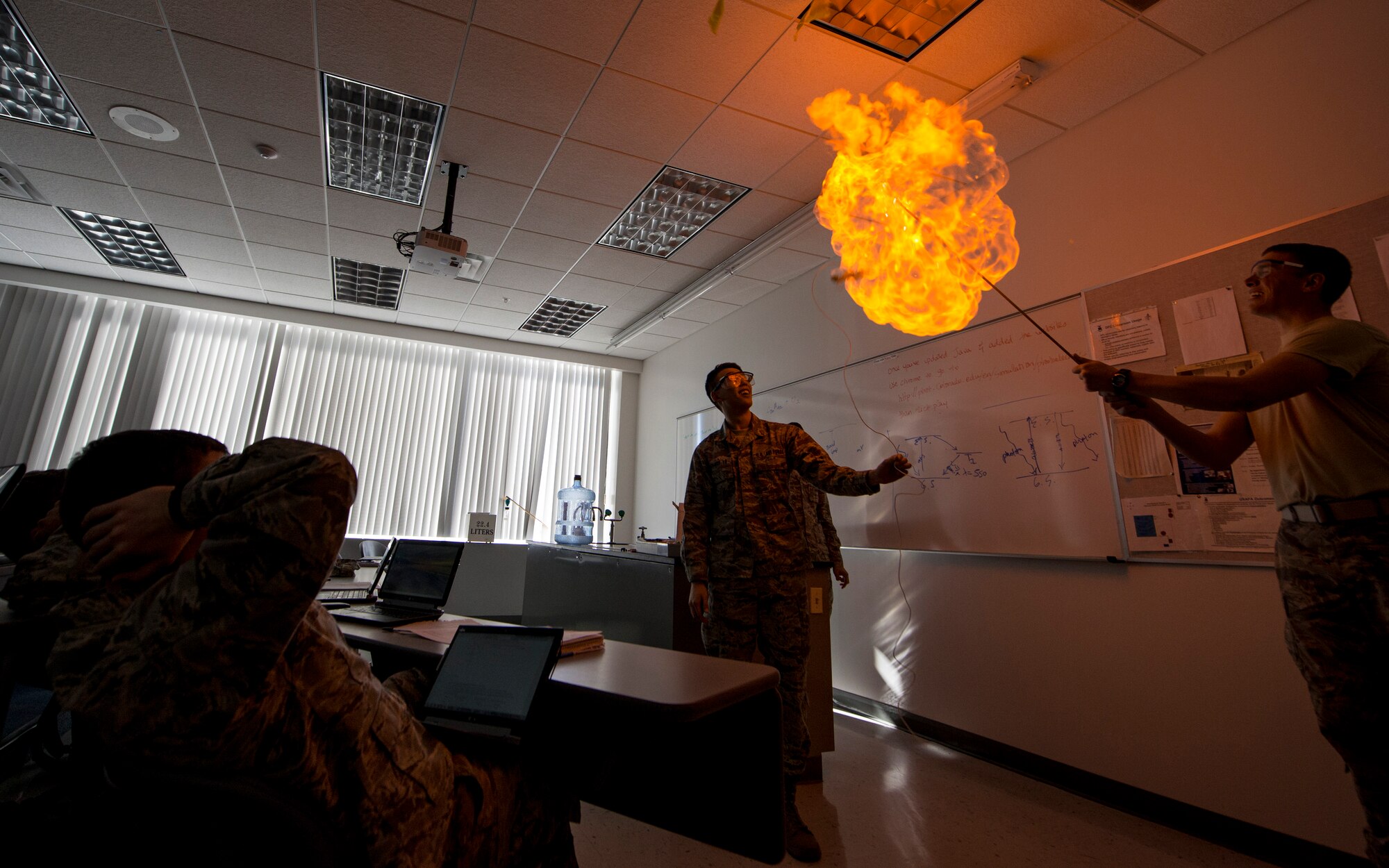 U.S. Air Force Academy cadets perform a science experiment on the dispersion of gas at the academy in Colorado Springs, Colo., Nov. 12, 2015. The class conducted multiple experiments throughout the day to include use of solar and flammable liquids. (U.S. Air Force photo/Staff Sgt. Christopher Griffin)